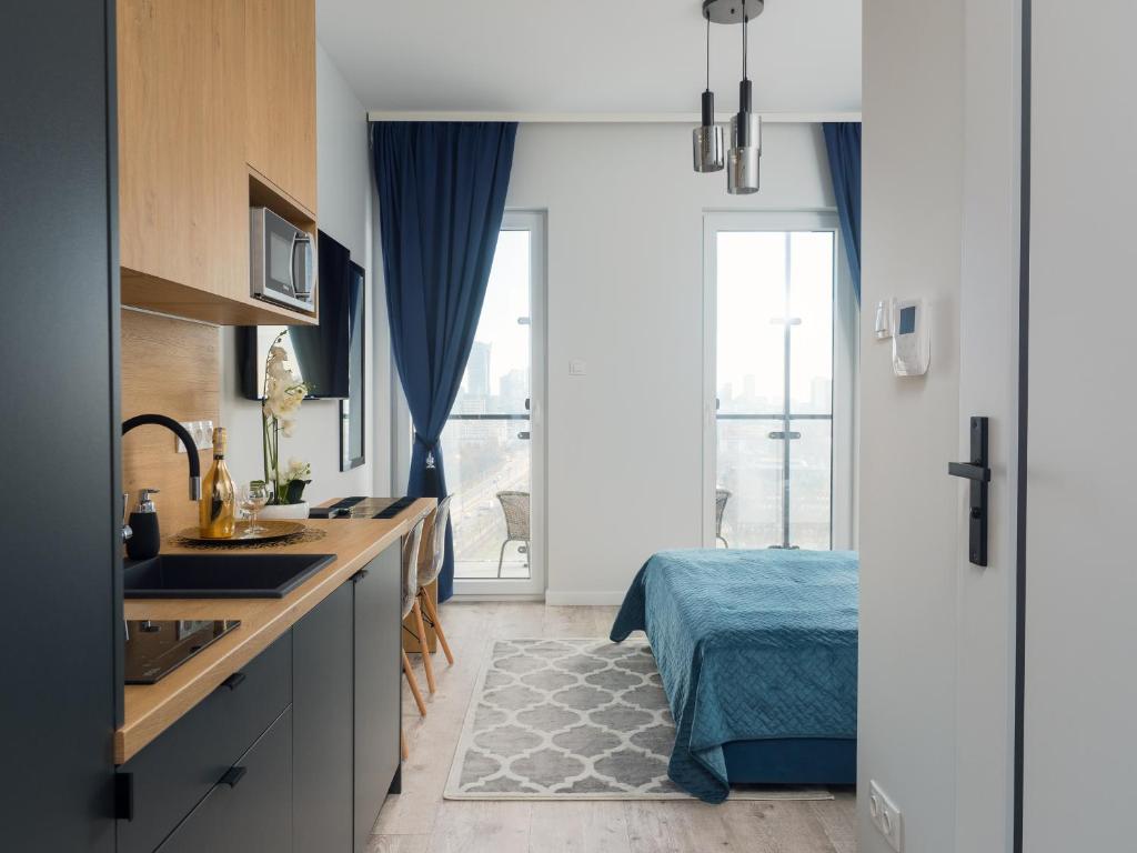 Posteľ alebo postele v izbe v ubytovaní Kasprzaka 29 Bliska Wola Tower By Perfect Apart