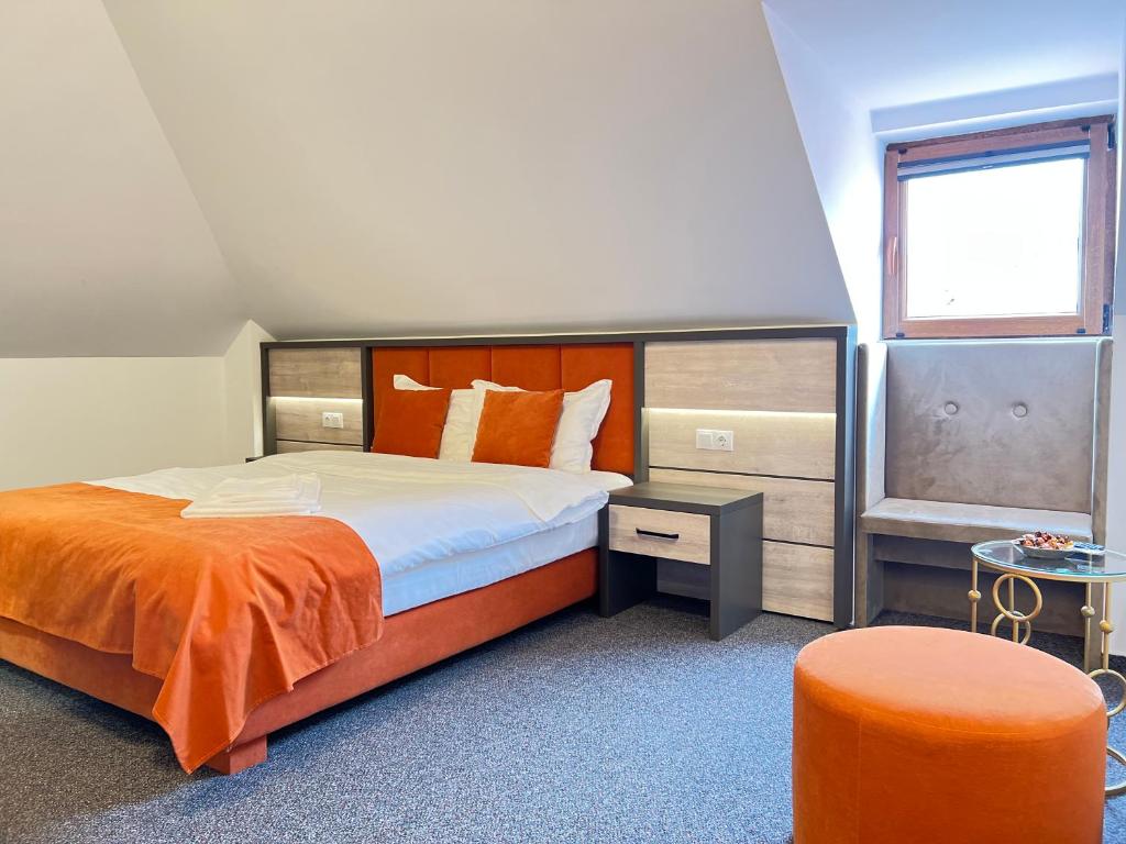 Postel nebo postele na pokoji v ubytování Loft by Lumiere Sibiu