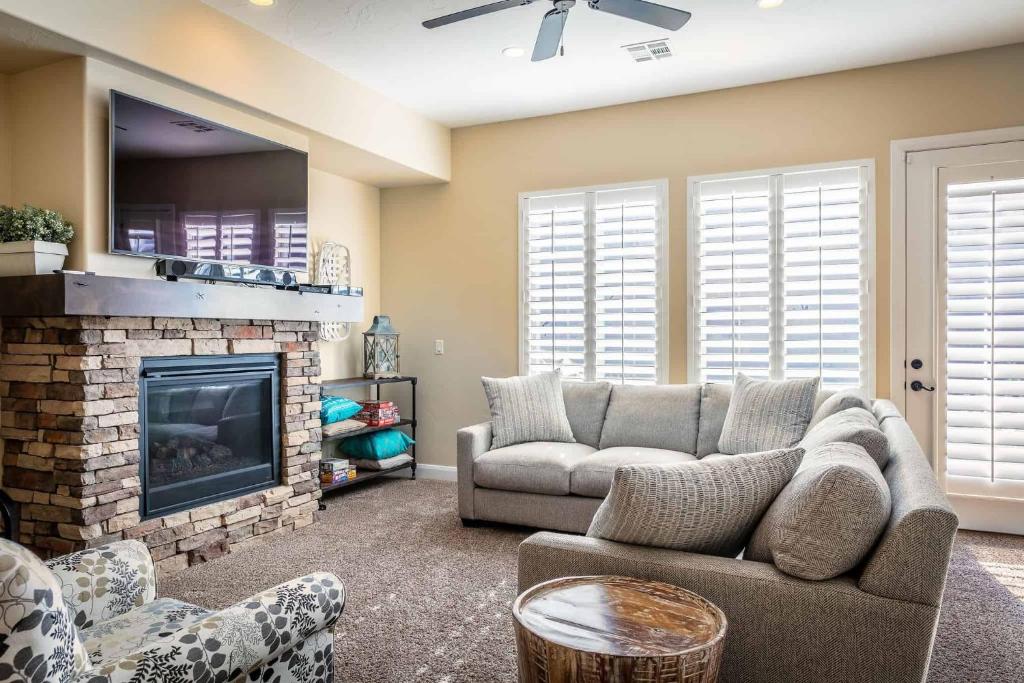 a living room with a couch and a fireplace at The Beach House townhouse in Washington