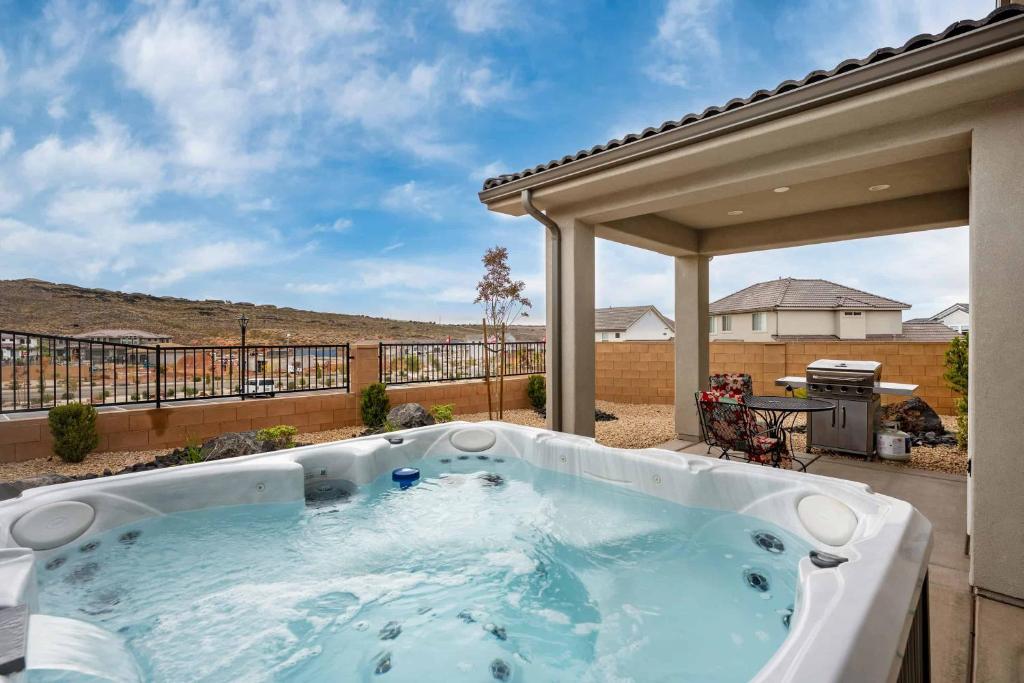 a hot tub on the patio of a house at The Bend at Paseos in Washington