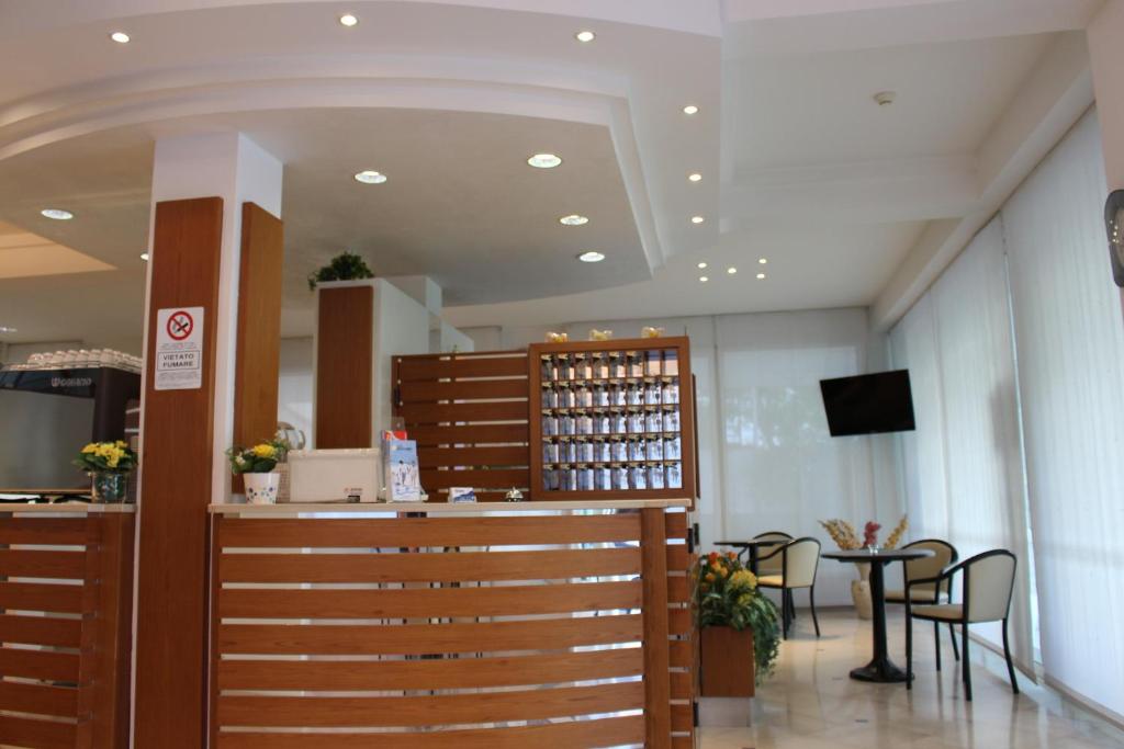 TV a/nebo společenská místnost v ubytování Hotel Massimo