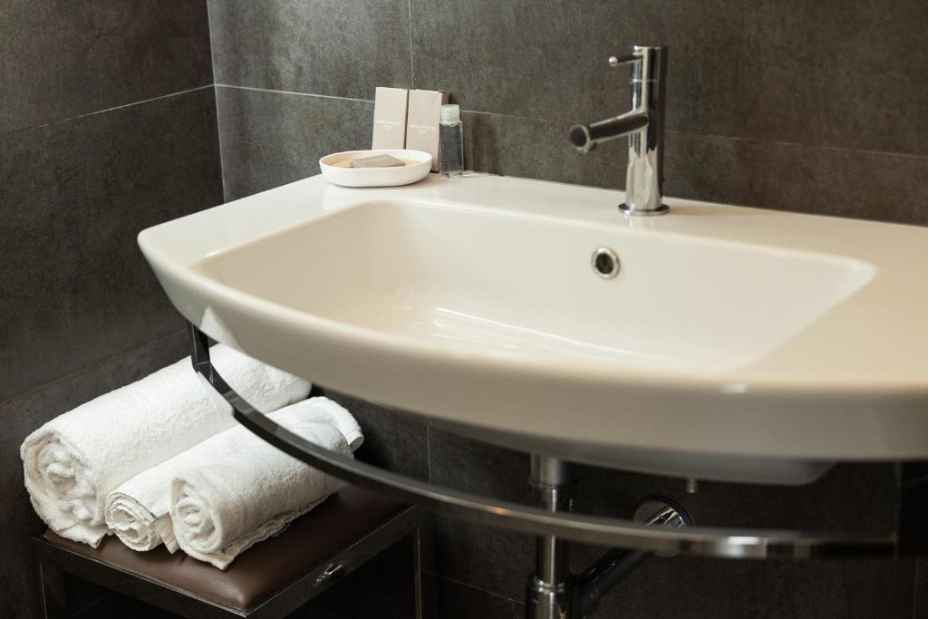 Koupelna v ubytování Baldinini Hotel