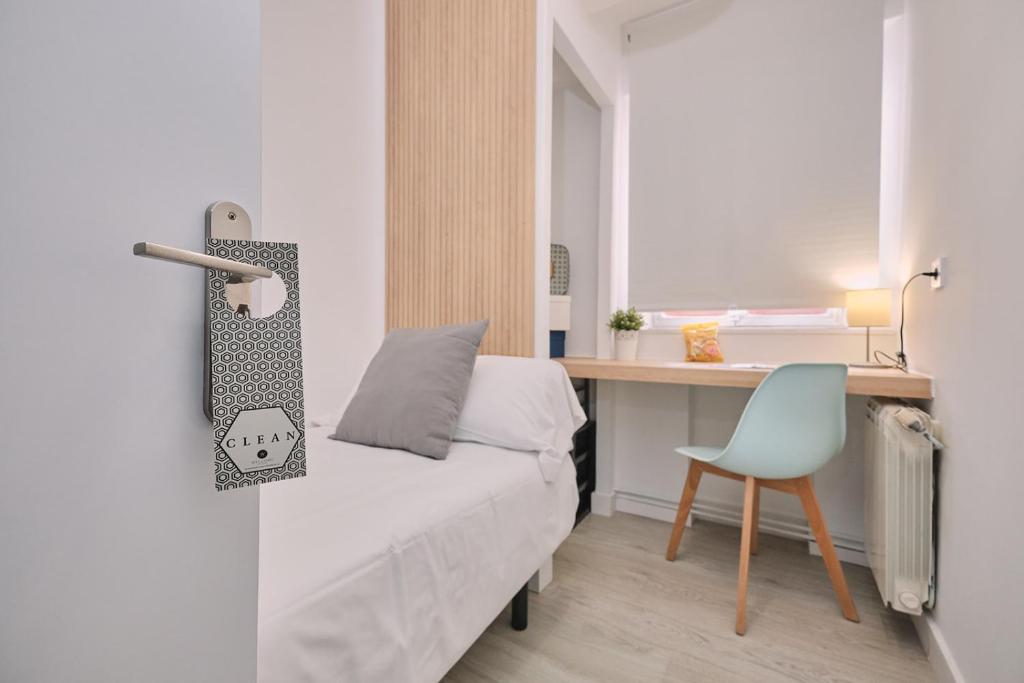 Postel nebo postele na pokoji v ubytování Dadá Coliving & Rooms by Serendipia Turismo