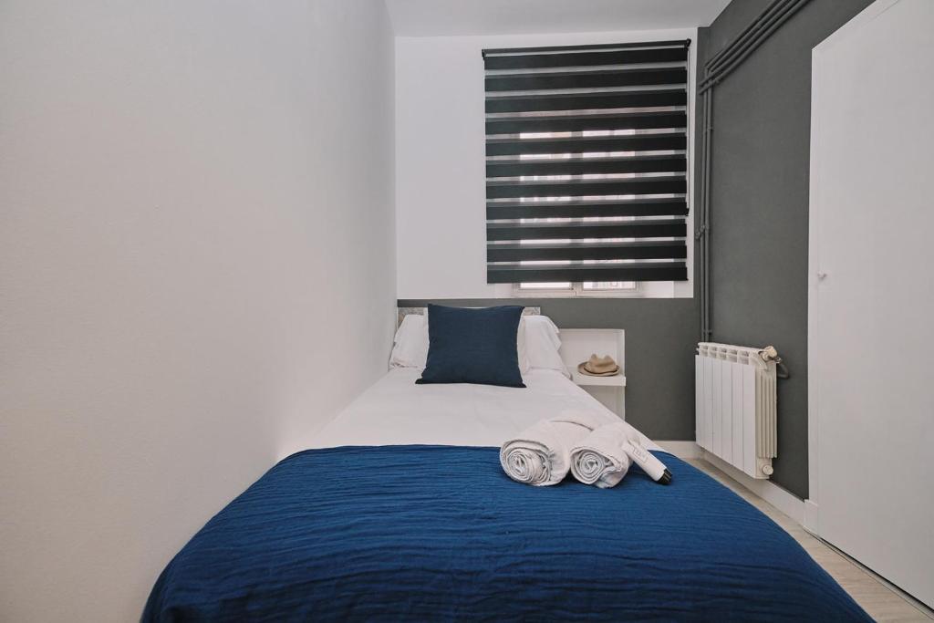 Postel nebo postele na pokoji v ubytování Dadá Coliving & Rooms by Serendipia Turismo