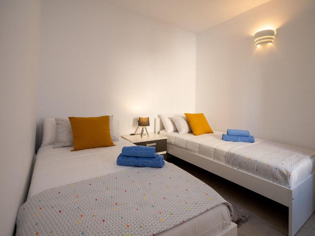 Posteľ alebo postele v izbe v ubytovaní Apartment Sakura by Interhome