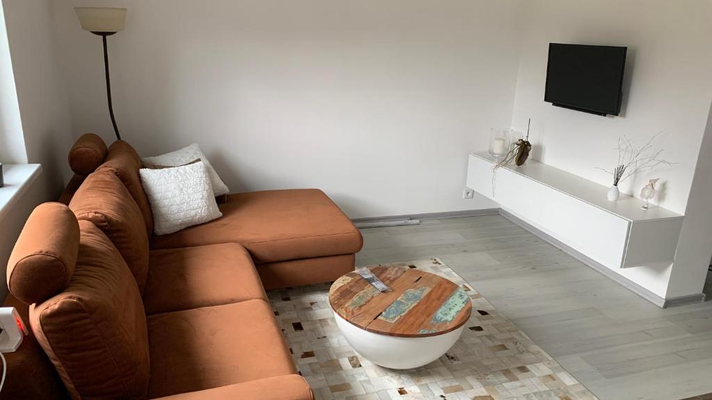 TV a/nebo společenská místnost v ubytování Apartman s bazénem a saunou