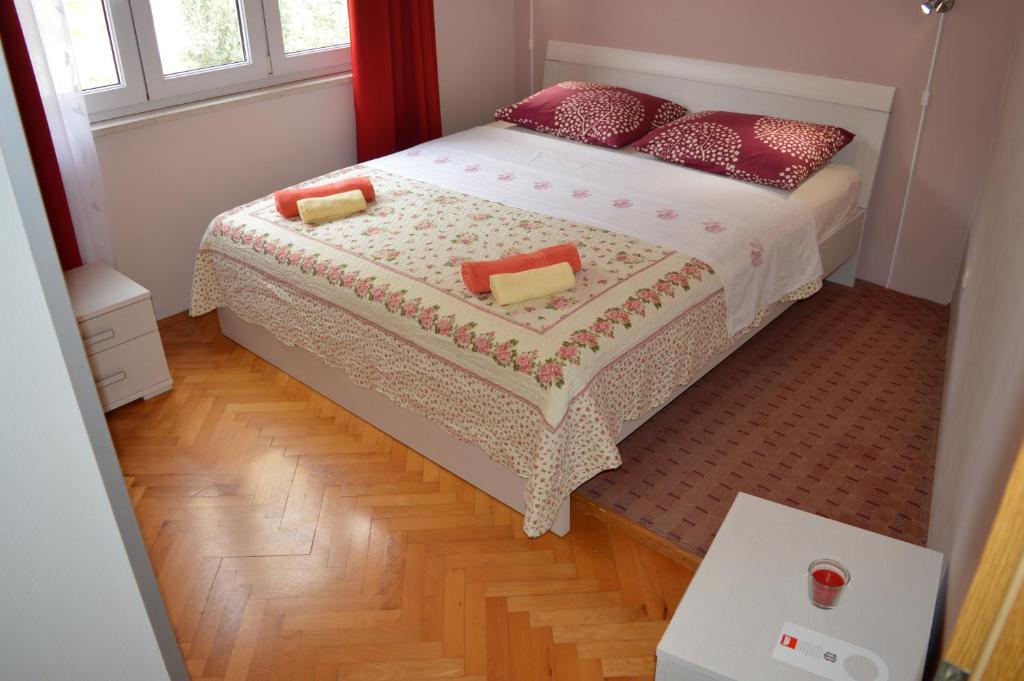 Postel nebo postele na pokoji v ubytování Apartment Nevena