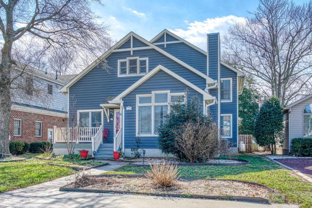 a house with a blue house at Family Tides - 311 - 139th Street home in Ocean City