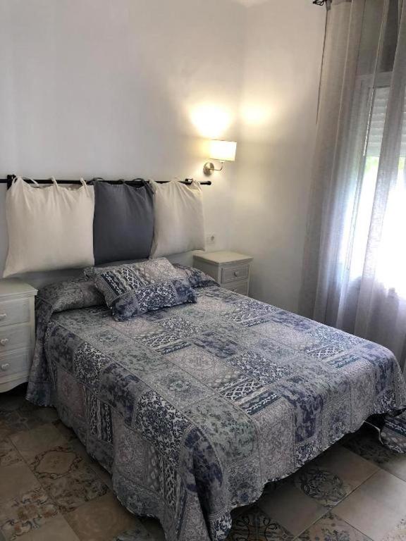 Posteľ alebo postele v izbe v ubytovaní Apartamentos Cala Isabel