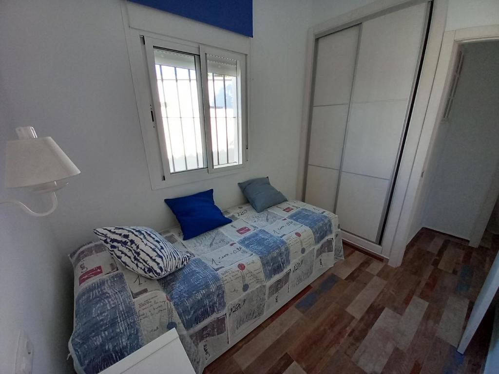 Posteľ alebo postele v izbe v ubytovaní Apartamentos Cala Isabel