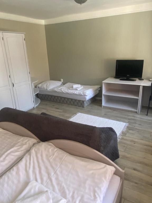 Postel nebo postele na pokoji v ubytování Hotel SEVERKA