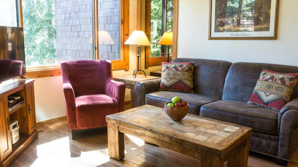 a living room with a couch and a coffee table at Ski Trails 4042 in Truckee