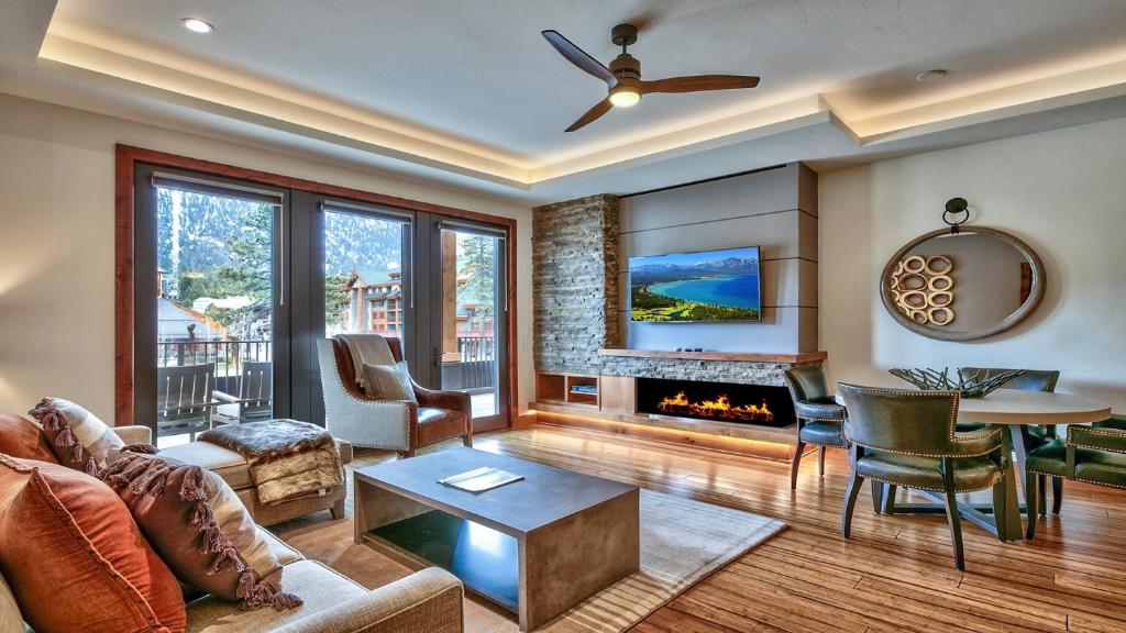 a living room with a couch and a fireplace at Zalanta 221 in South Lake Tahoe
