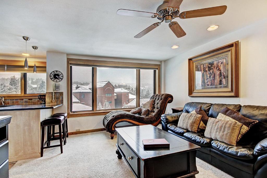 a living room with a couch and a table at Village at Breck V4510 in Breckenridge