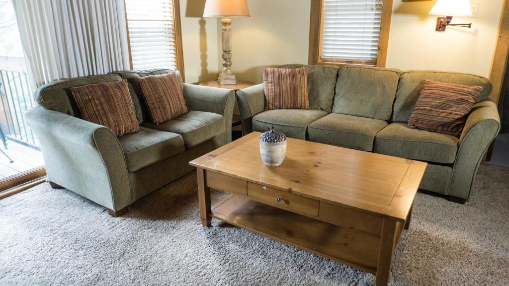a living room with two couches and a coffee table at Indian Hills 6020 in Truckee