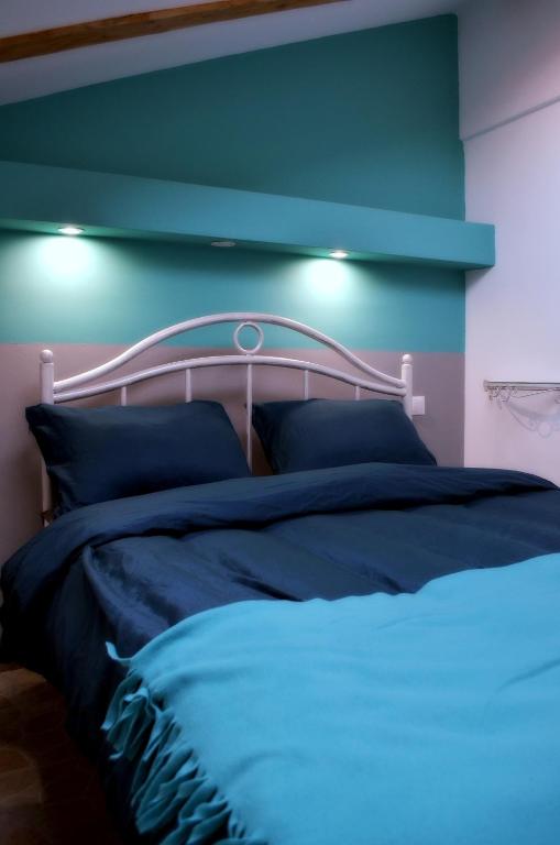 Voodi või voodid majutusasutuse Retro Hostel toas