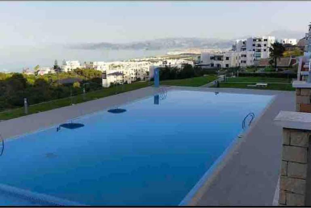 Bazén v ubytování Complexe Bella Vista Cabo Negro Martil Mdiq avec Piscines Plage WIFI nebo v jeho okolí