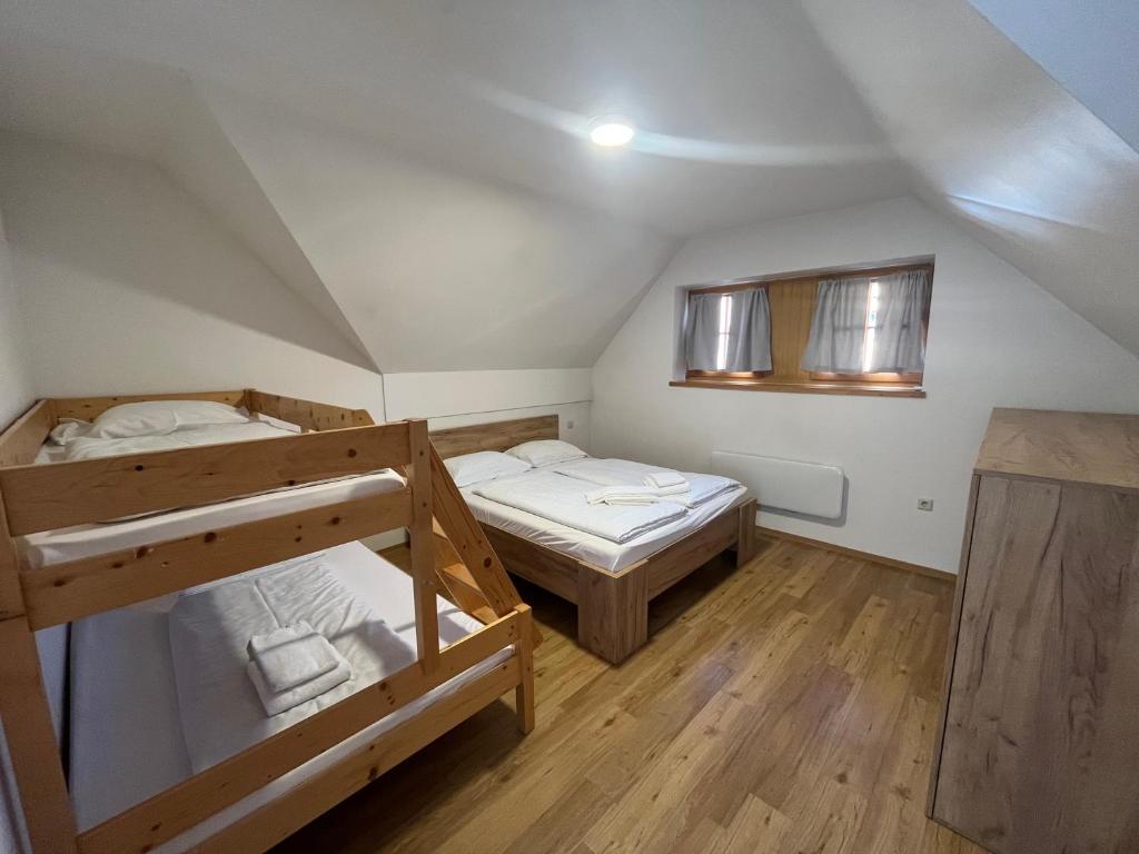 Postel nebo postele na pokoji v ubytování Apartments Prekmurska vas - Vital Resort