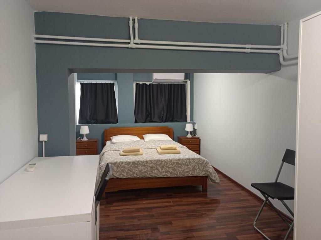 Кровать или кровати в номере Apartment Dipla 2