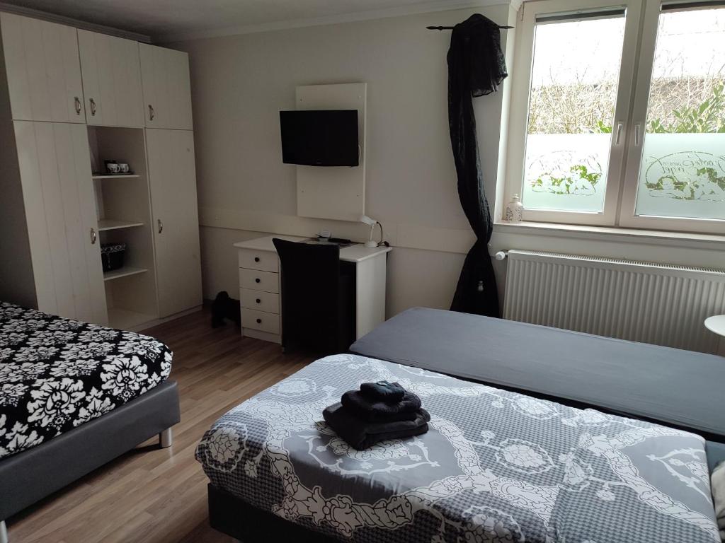 Postel nebo postele na pokoji v ubytování Hotel Groote Engel
