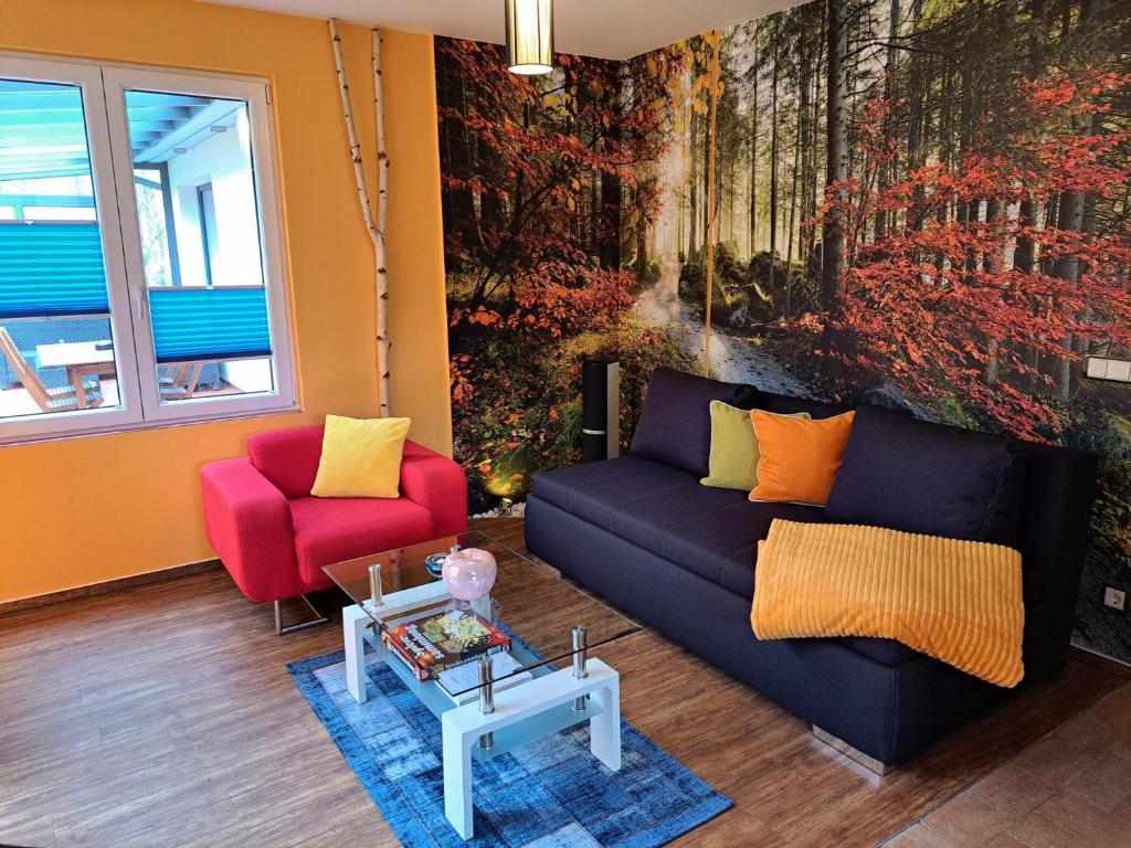 Posezení v ubytování Ferienhaus Rehblick - direkt in der Natur, mit Lesezimmer und zwei Terrassen