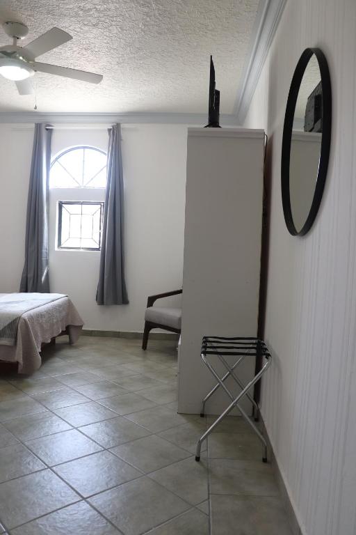 Postel nebo postele na pokoji v ubytování Hotel Plaza San Juan