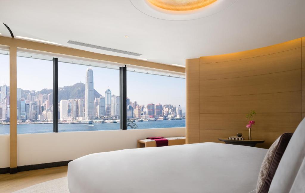 Postel nebo postele na pokoji v ubytování Regent Hong Kong