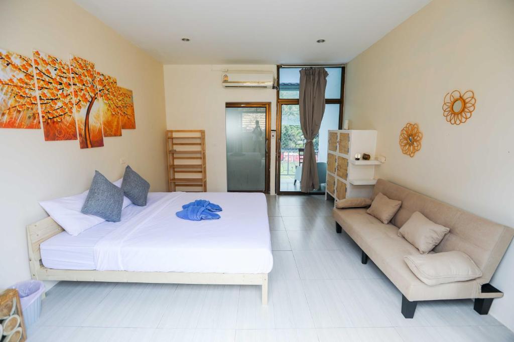 Postel nebo postele na pokoji v ubytování Phangan Arena Hostel