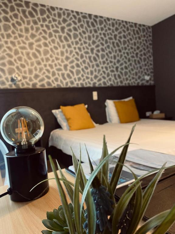 Postel nebo postele na pokoji v ubytování New Hotel de Lives