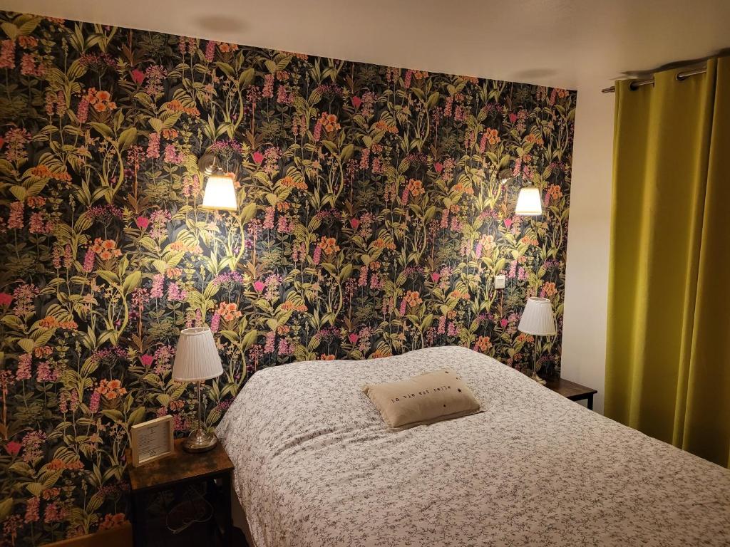 Postel nebo postele na pokoji v ubytování LE RELAIS VAUBAN