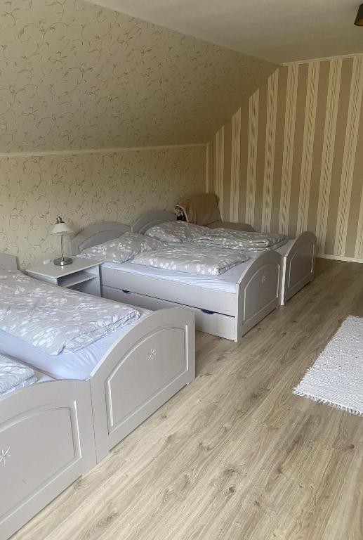 Postel nebo postele na pokoji v ubytování Hotel SEVERKA