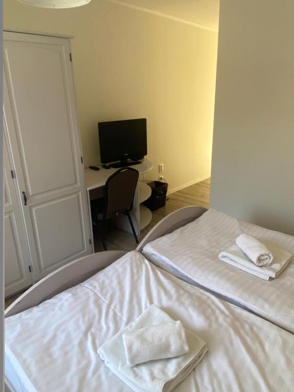Postel nebo postele na pokoji v ubytování Hotel SEVERKA