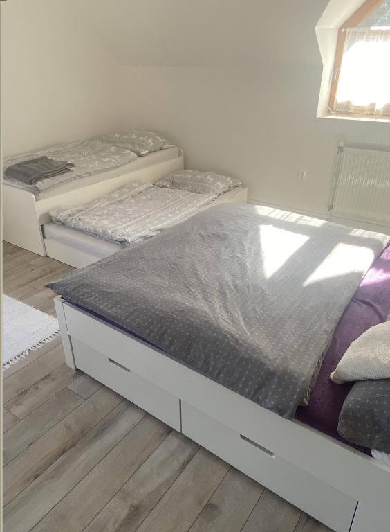 Postel nebo postele na pokoji v ubytování Hotel SEVERKA
