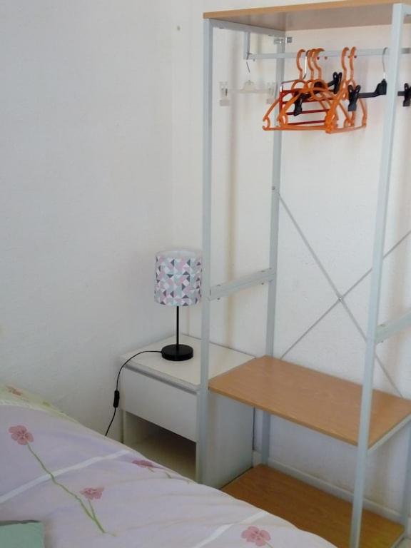 Łóżko lub łóżka w pokoju w obiekcie Gruissan (Aude) Appartement calme, vue sur port de plaisance -Clim, Empl.Parking