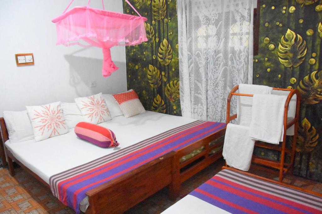 Postel nebo postele na pokoji v ubytování S P City Resort