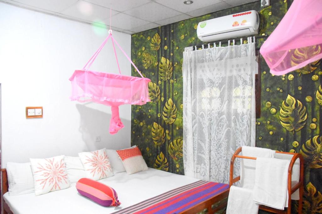 Postel nebo postele na pokoji v ubytování S P City Resort