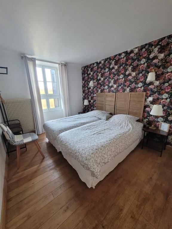Postel nebo postele na pokoji v ubytování LE RELAIS VAUBAN