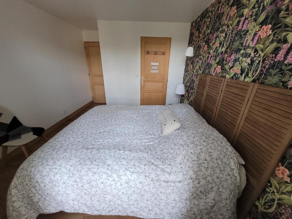 Postel nebo postele na pokoji v ubytování LE RELAIS VAUBAN