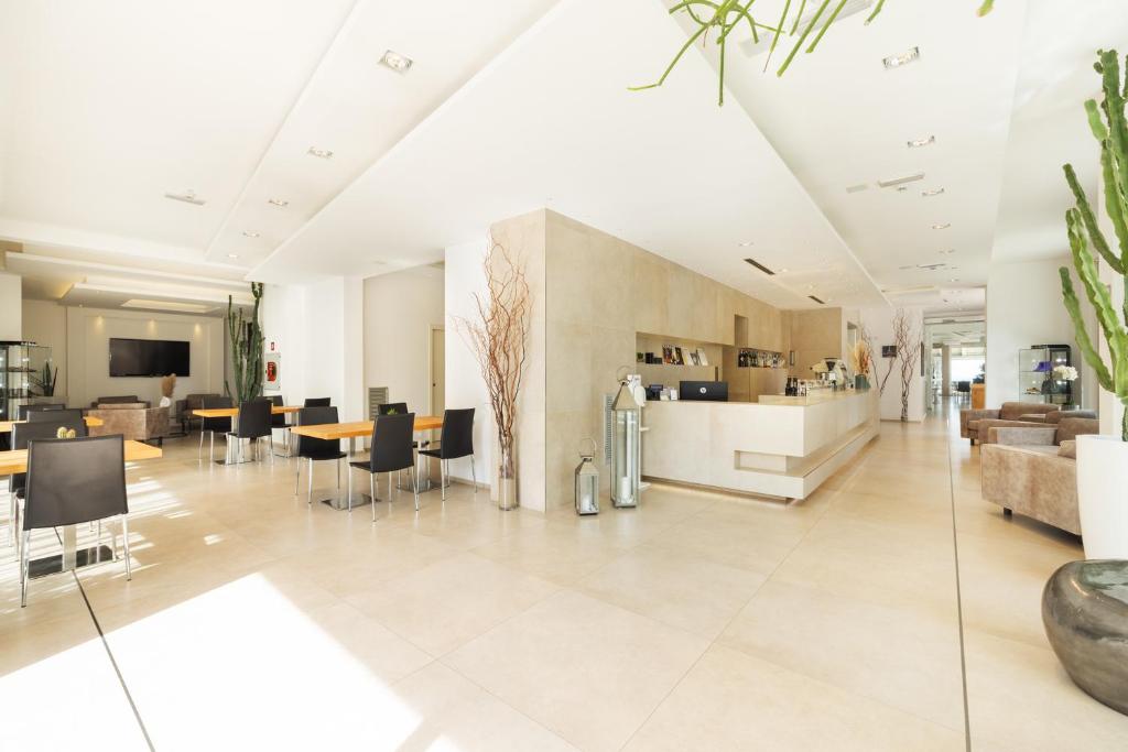 TV a/nebo společenská místnost v ubytování Baldinini Hotel