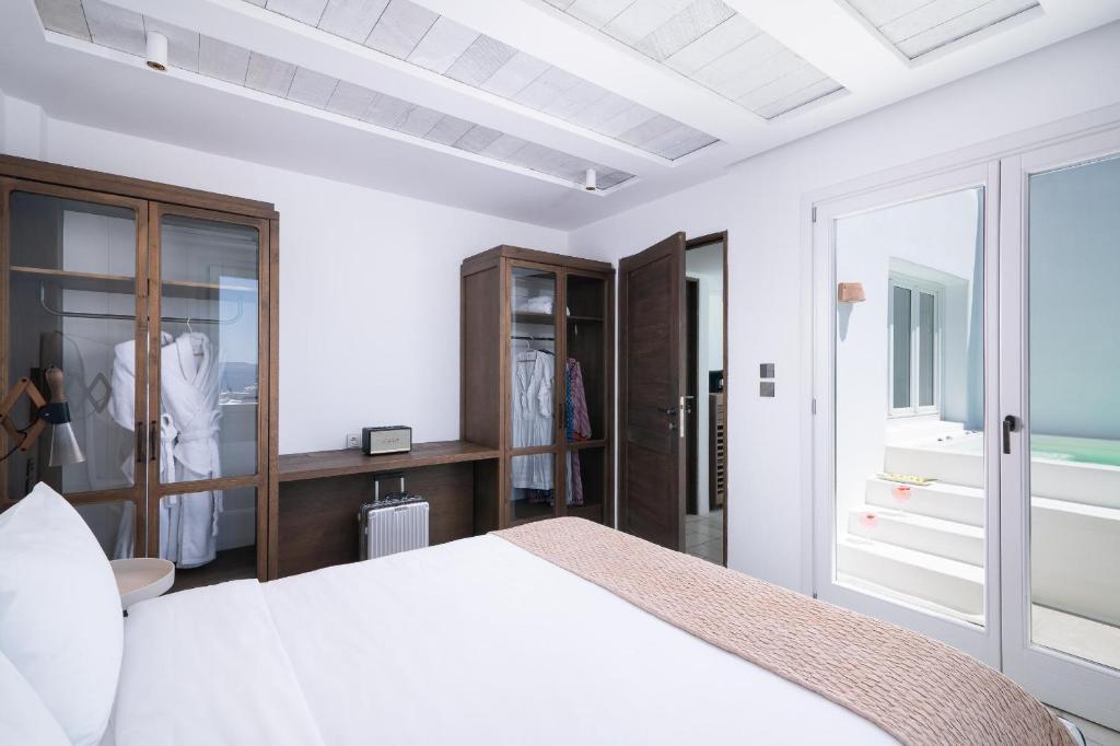 Posteľ alebo postele v izbe v ubytovaní Porto Mykonos