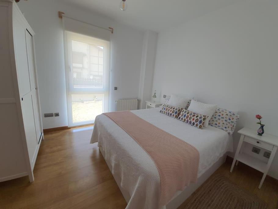 A bed or beds in a room at El Rincón de Gabriela