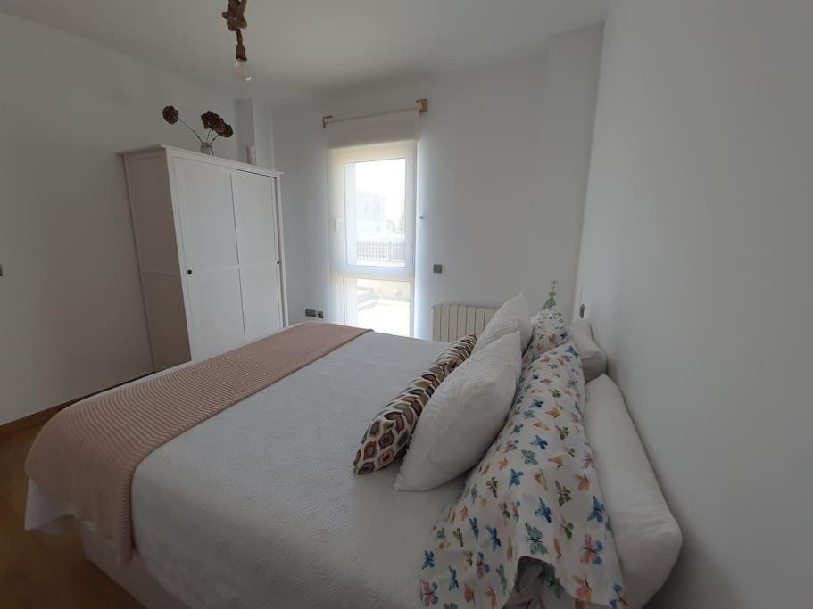 A bed or beds in a room at El Rincón de Gabriela
