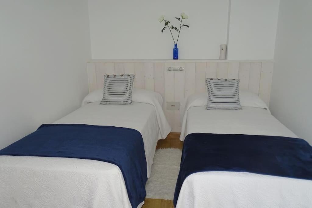 A bed or beds in a room at El Rincón de Gabriela
