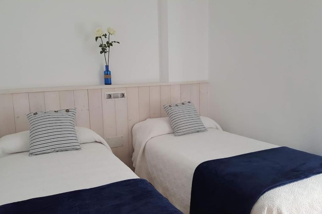 A bed or beds in a room at El Rincón de Gabriela