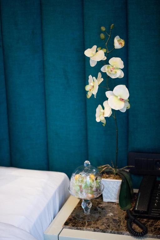 Letto o letti in una camera di CRYSTAL Hotel Belgrade