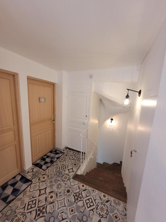 Postel nebo postele na pokoji v ubytování LE RELAIS VAUBAN