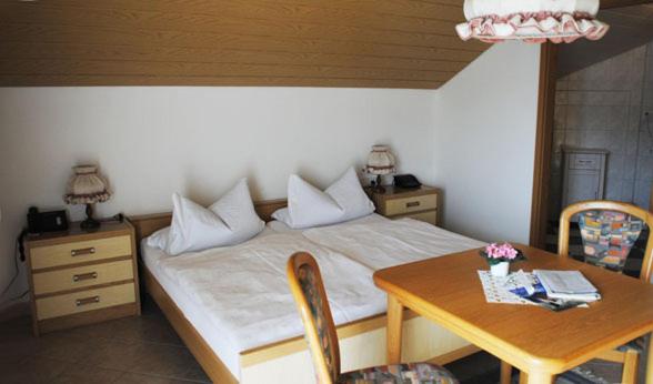 Postel nebo postele na pokoji v ubytování Gasthof-Hotel-Löwen