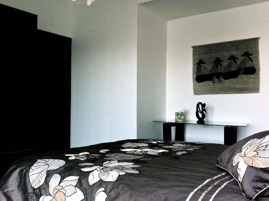 Postel nebo postele na pokoji v ubytování B&B Oui Madame