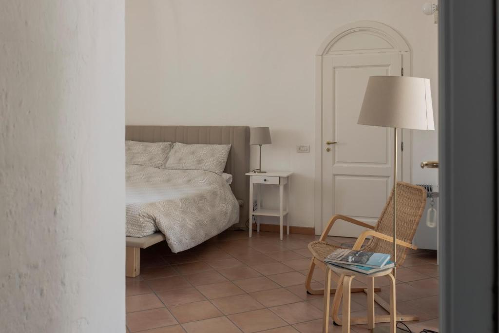Postel nebo postele na pokoji v ubytování Il Vicinato, casa vacanza immersa nel cuore dei Sassi