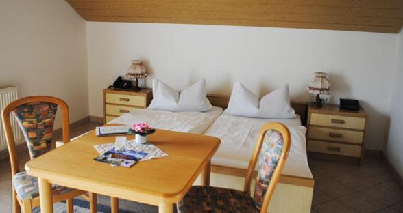 Postel nebo postele na pokoji v ubytování Gasthof-Hotel-Löwen